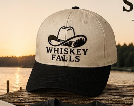 Whiskey Falls cap on a dock at sunset